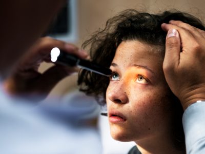 young-caucasian-girl-getting-eye-examination